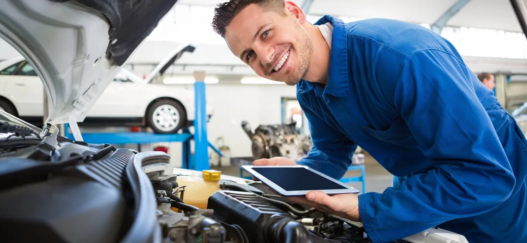 Ford-trained technician servicing a vehicle at Huntley Ford