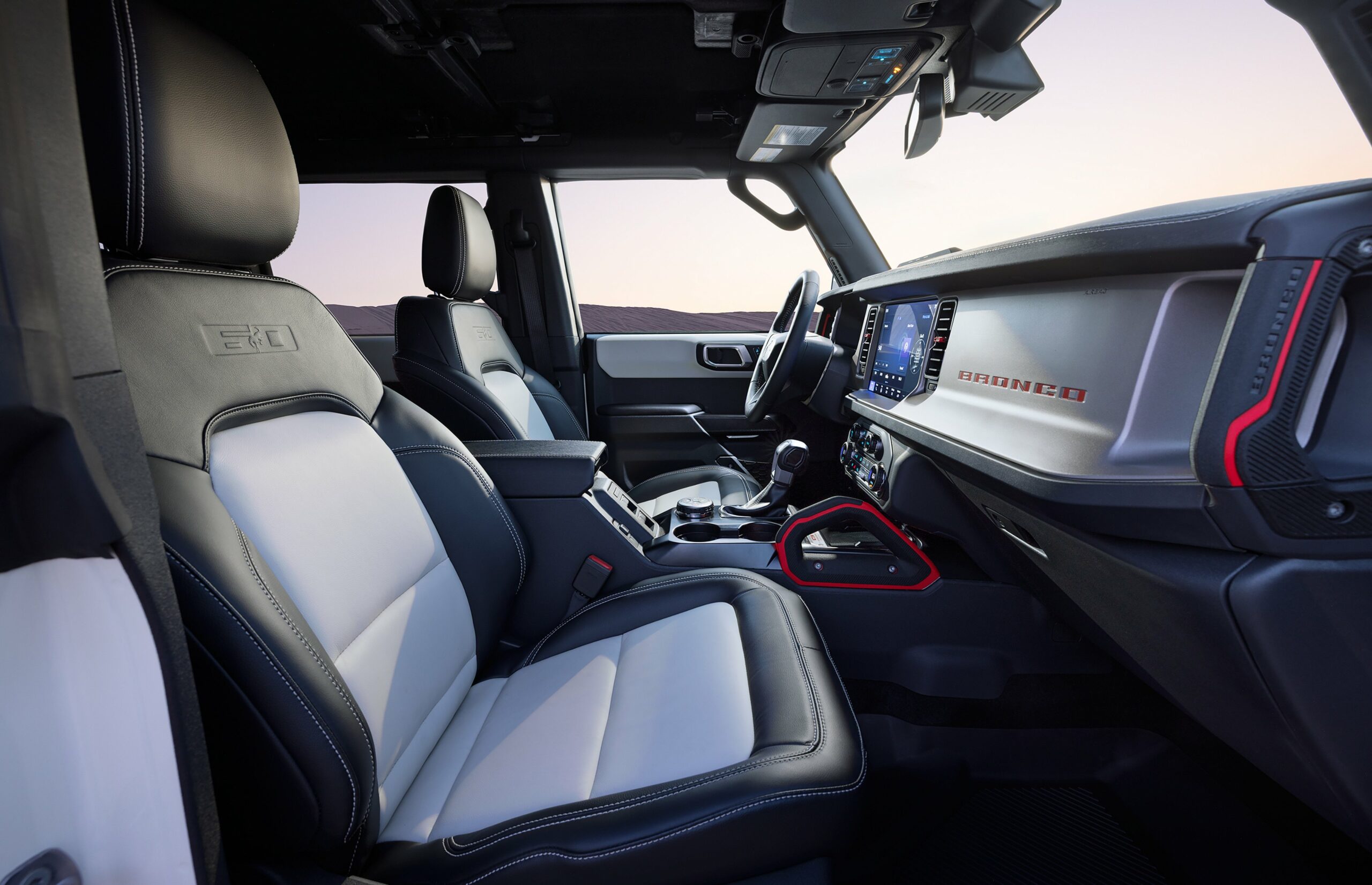The front seats and dashboard of a 2026 Ford Bronco