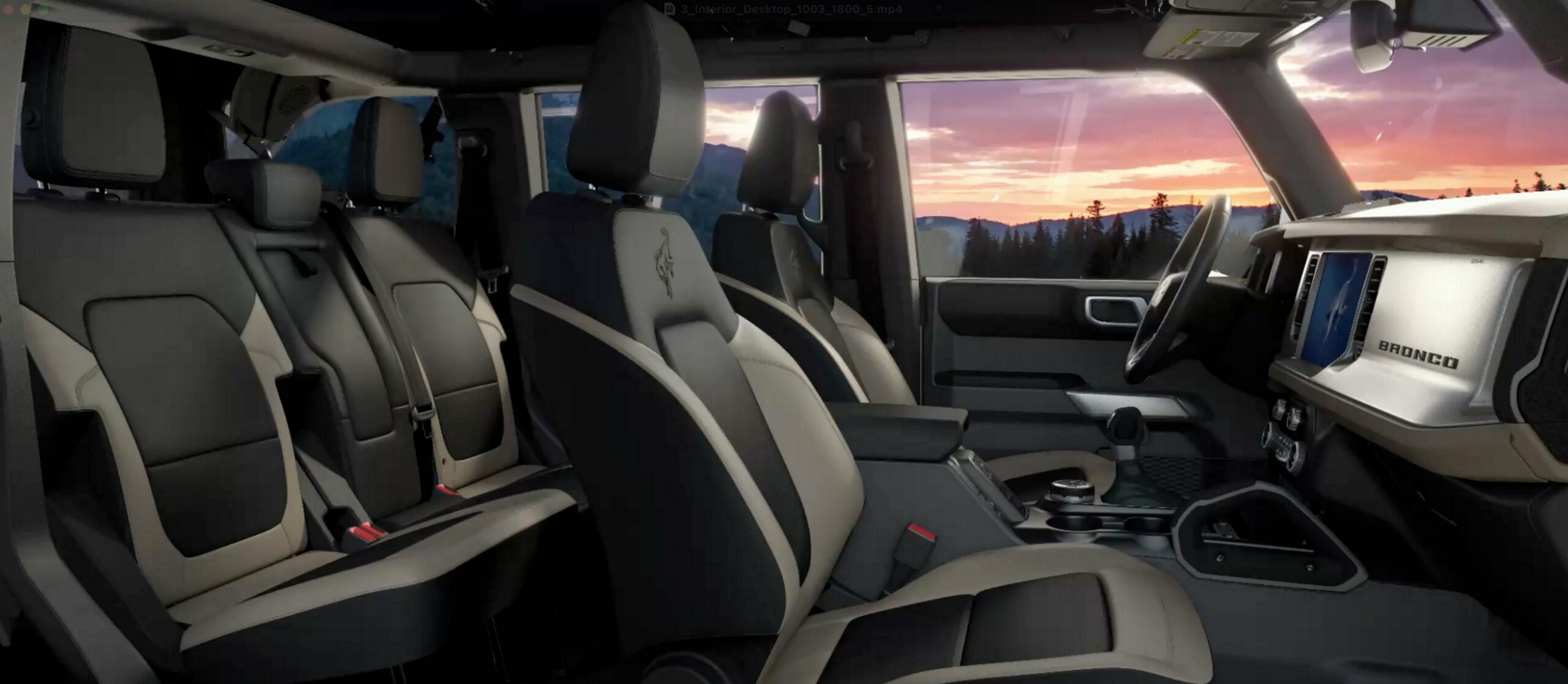 The cabin of a 2026 Ford Bronco seen from the rear seats