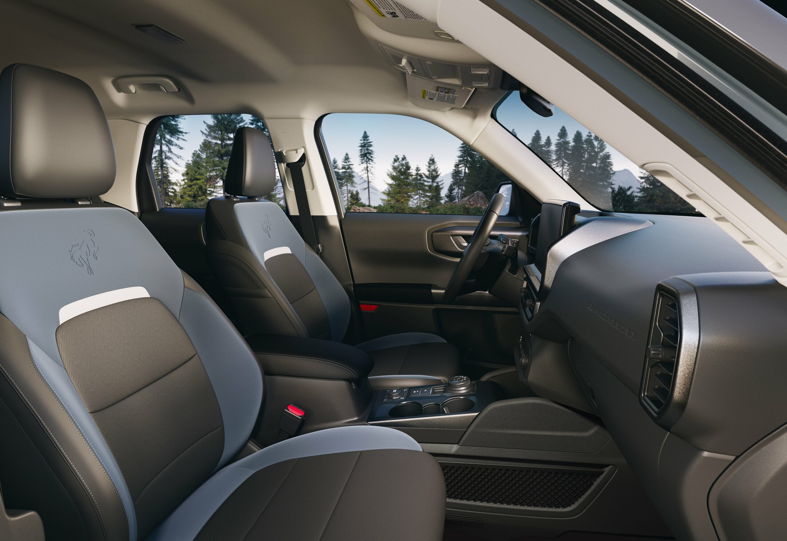 The front seats and cabin of a 2026 Ford Bronco Sport Outer Banks