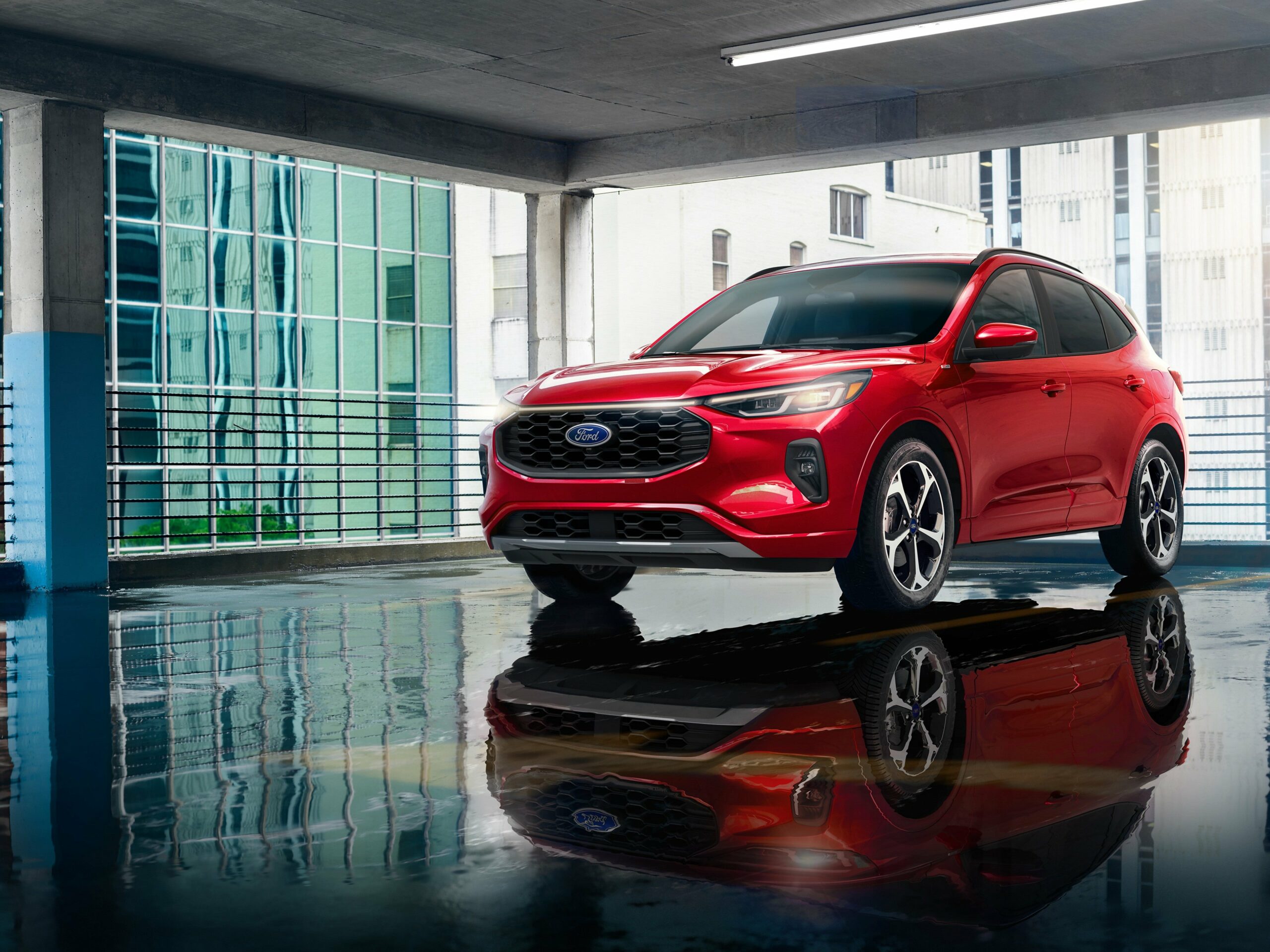 A red 2026 Ford Escape on a polished floor