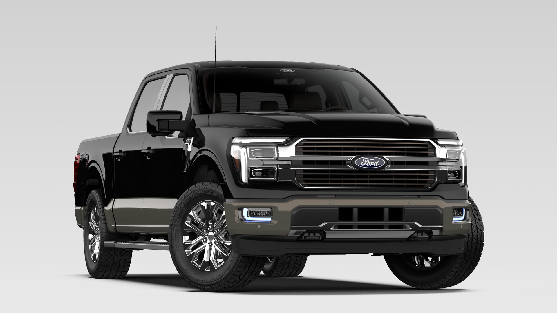 A 2026 Ford F-150 King Ranch SuperCrew in Agate Black Metallic with a two-tone lower body and chrome wheels