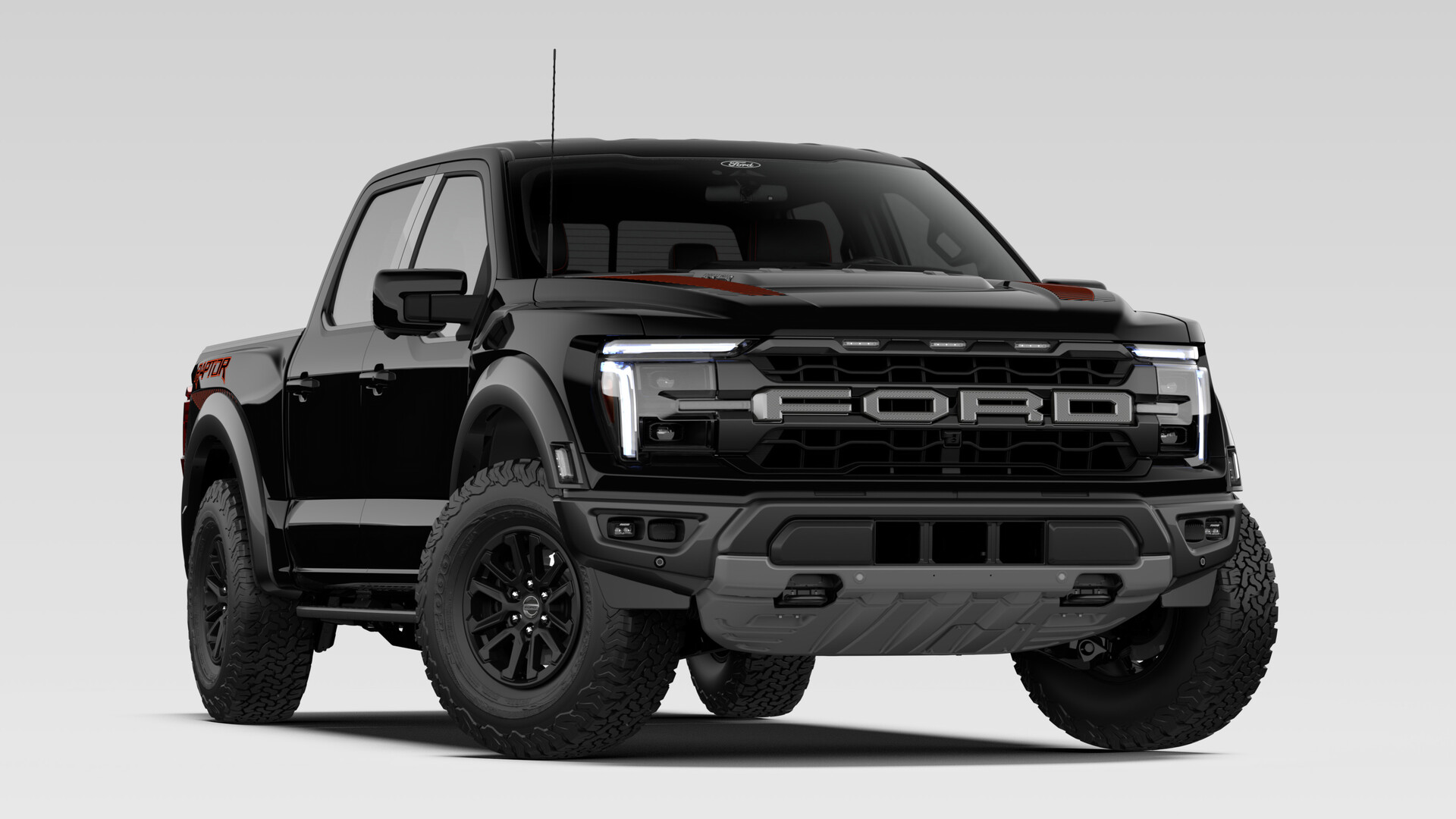 A 2026 Ford F-150 Raptor SuperCrew in Agate Black Metallic with a block-lettered FORD grille, flared fenders and all-terrain tires